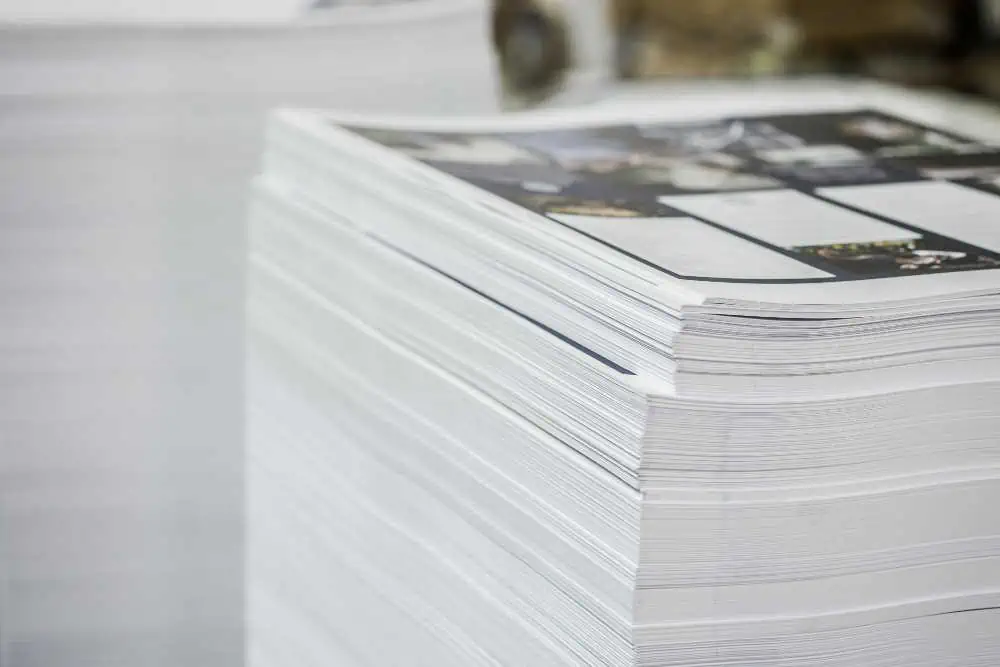 stack of magazines in a factory. made using a commercial print mis with printvis for business central
