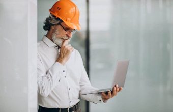 middle-aged-business-man-hard-hat-landscape
